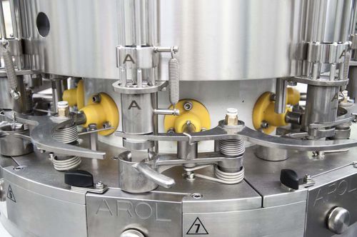 Ротационная укупорочная машина SATURNOмногоголовочнаяавтоматическаядля стеклянных бутылок