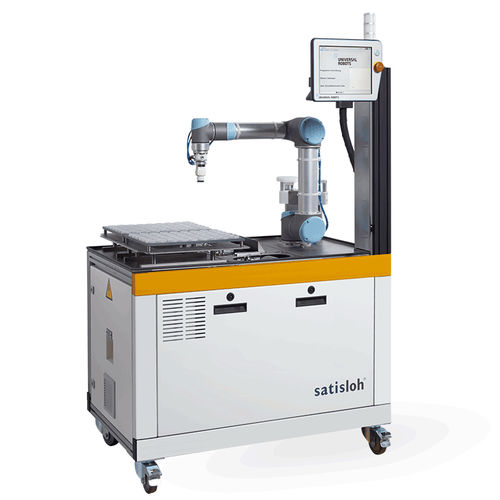 Optical lens materials handling system HS-200automatedmodularworkpiece