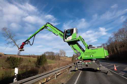 Wood material handler 728 Erubber-tiredhydraulicdiesel engine